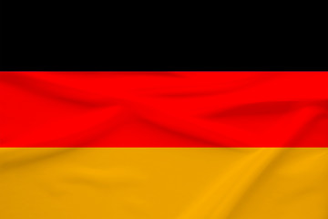 national flag of the country Germany on gentle silk with wind folds, travel concept, immigration, politics, copy space, close-up