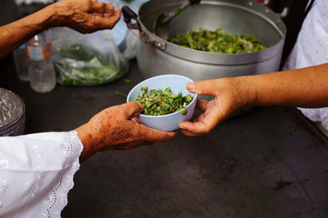 Food sharing in human societies can help homeless people : concept Sharing Food With Homeless