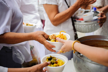 Food sharing in human societies can help homeless people : concept Sharing Food With Homeless