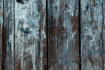 vintage blue wood background texture with knots and nail holes. Old painted wood. Blue abstract background.