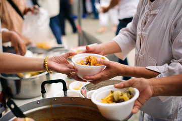 Help serving free food to the poor Needy : concept Sharing Food With Homeless
