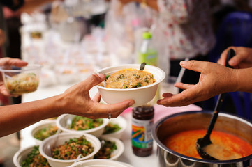 concept of poverty in Asian society : Charity food is free for people in slums