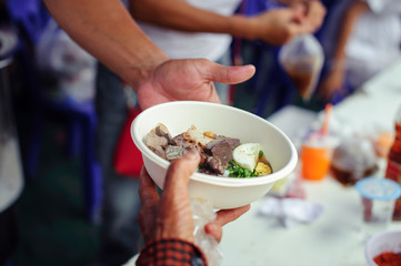 concept of poverty in Asian society : Charity food is free for people in slums
