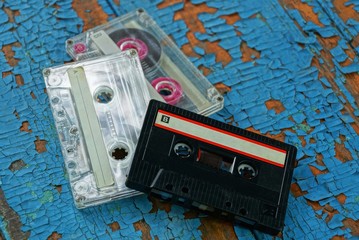 three  audio tapes are on the blue board