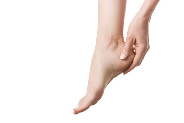 Female bare foot tired of tight footwear, woman touch her heel by fingers. Isolated on white, close up