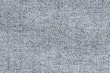 Fototapeta na wymiar Unique light grey fabric background close up.