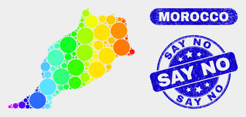 Rainbow colored dotted Morocco map and seal stamps. Blue round Say No grunge watermark. Gradient rainbow colored Morocco map mosaic of randomized small spheres. Say No watermark with grunge texture.