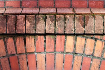 Close up view on old and weathered red  and yellow brick walls in high resolution