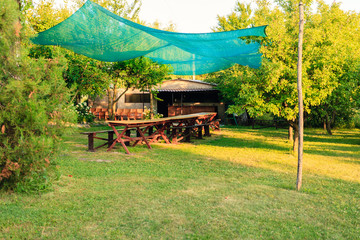 Dinner table in the garden of the camp.
