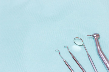 Fototapeta premium Dentist tools - probe, mirror, tweezers and drill