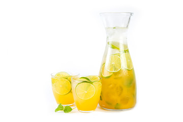 Natural orange lemonade with citrus and mint on white background. Detox drink for a healthy lifestyle.