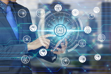 Businessman use tablet with virtual screen Artificial Intelligence technology icon over the Network connection, Artificial Intelligence Technology Concept.