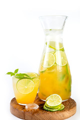 Natural orange lemonade with citrus and mint on white background. Detox drink for a healthy lifestyle.