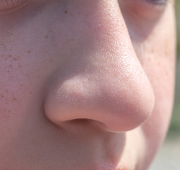 Nose teen girl close up side view