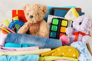 Colorful clothes for children or teenagers, toys and stationery.