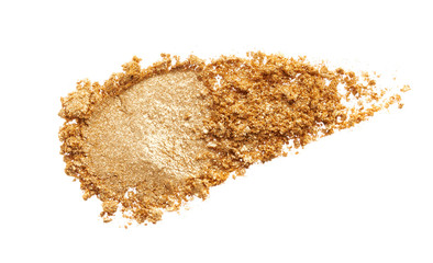 Texture of gold eye shadow isolated on white background. Macro texture of broken gold powder
