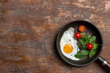 Copy space for text with pan, egg and vegetables