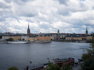 Fototapeta na wymiar Stockholm. The view of Old Town (Gamla Stan) on summer cloudy day. Panoramic view of the old part of city Stockholm, Sweden. 