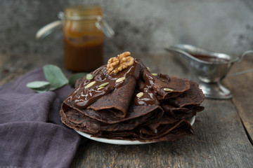 Chocolate pancakes for Breakfast with hot chocolate.Selective focus.