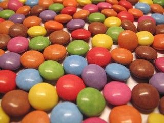 Colourful colorful candies sweets chocolates buttons Smarties Skittles M&M’s