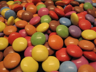 Colourful colorful candies sweets chocolates buttons Smarties Skittles M&M’s