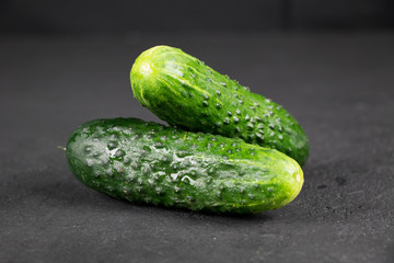 fresh cucumber on gray background