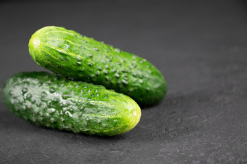 fresh cucumber on gray background