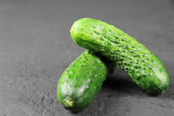 fresh cucumber on gray background