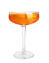 Tasty jelly dessert with slices of orange in glass on white background
