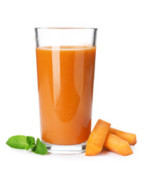 Carrot and glass of fresh juice on white background