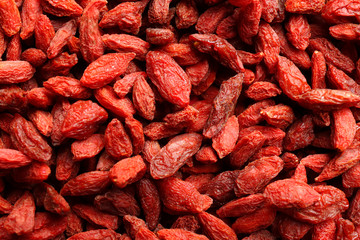 Many dried goji berries as background, closeup. Healthy superfood © New Africa