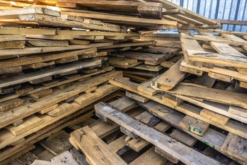 broken boards, wooden pallets. Industrial Warehouse