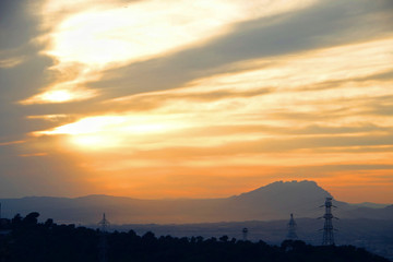 Mountain silhouette with a precious sunrise.