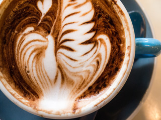Rosetta latte art in a cup of espresso café mocha