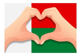 Fototapeta premium Madagascar flag and hand heart shape