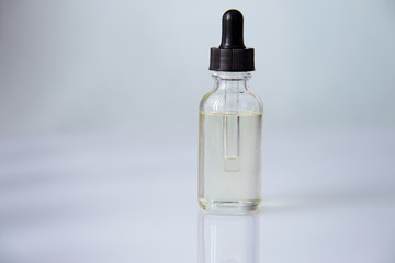 Dropper glass bottle with pipette. Mock up Essential liquid .