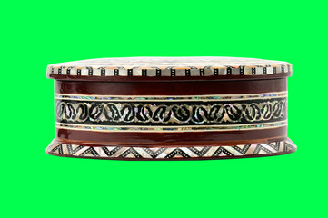Wooden box with ornaments for jewelry and bijoux on a white background