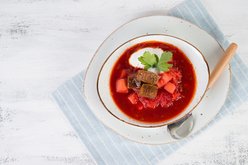 Traditional Ukrainian borsch with beef and sour cream