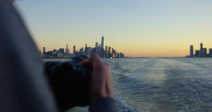 Photographing Sunset On Hudson River whilst Moving Away From Iconic New York Skyline And Impressive Skyscrapers at Sunset In Beautiful New York