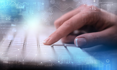 Business woman hand typing on keyboard with international system concept