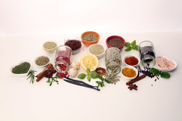 Spices and herbs on table. Food and cuisine ingredients with basil