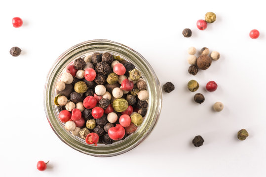 Multi Colored Peppercorns in a Spice Jar