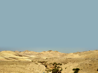 Desert land landscape with rocks, hills and mountains