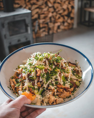 Delicious caesar salad and goatcheese salad on wooden table