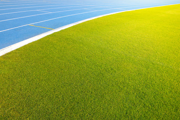 running track/The football field has a running track/Empty running track for the background with...