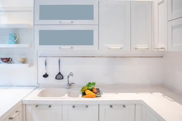 Fototapeta na wymiar Clean white kitchen/New modern kitchen interior/Background of kitchen /