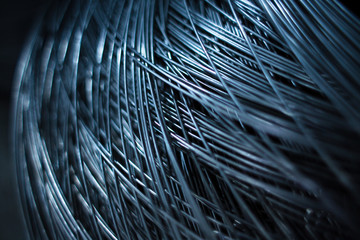 Close up wire coil metal material texture for industrial background