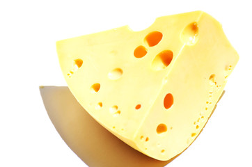 Close-up piece of cheese isolated on white background, food photo