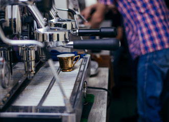 Close-up of esspresso maker with special coffee in traditional bar