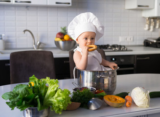  little boy, white chef hat, vegetables